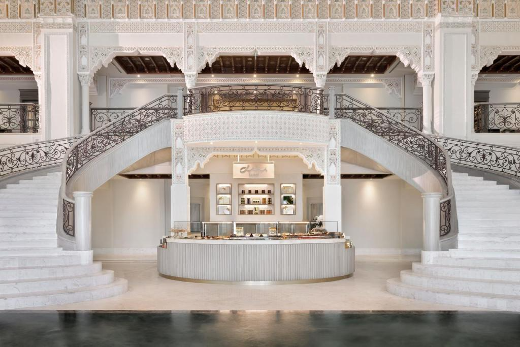 freepik__photo-a-grand-white-ornate-interior-with-a-circula__48923