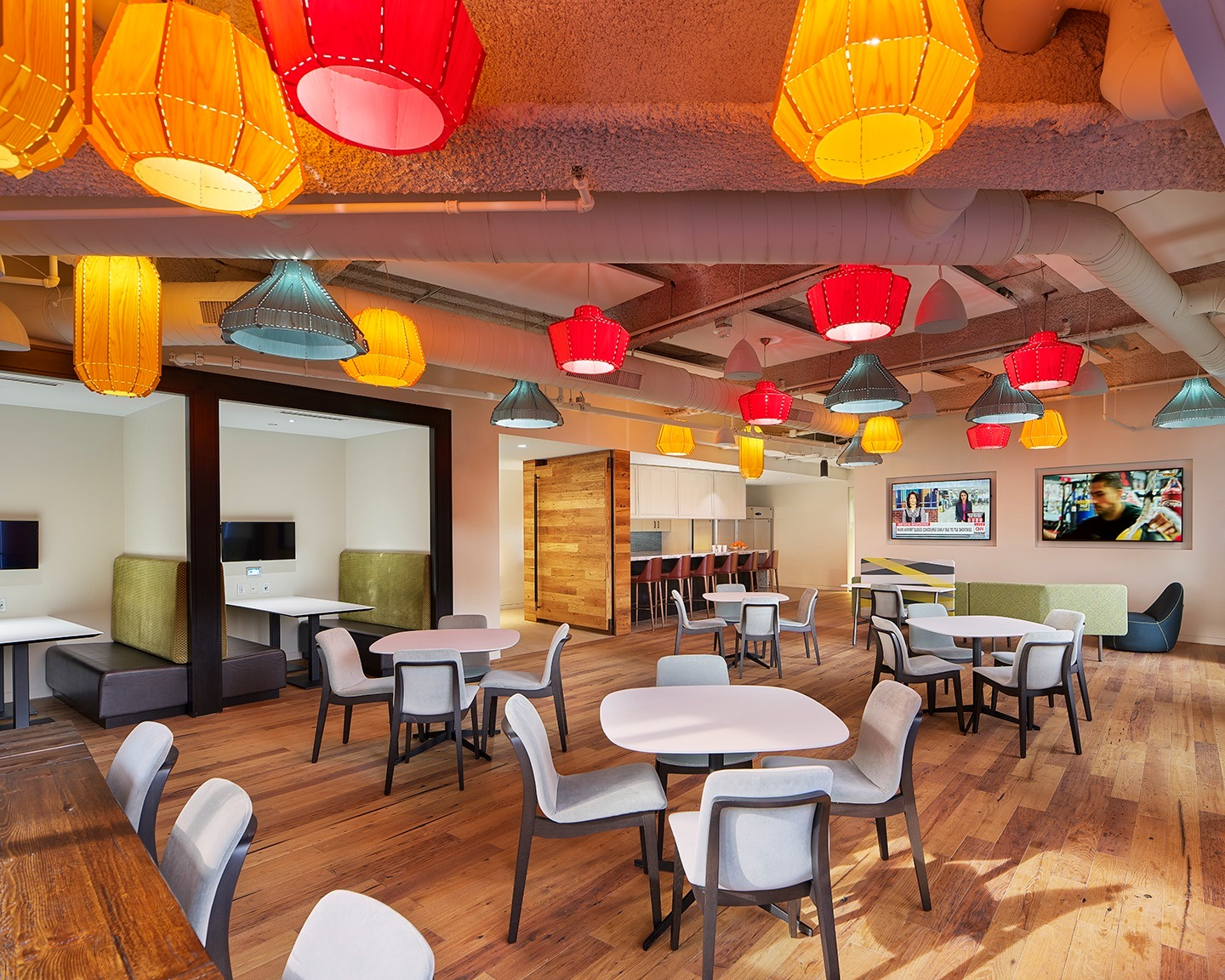 freepik__photo-a-modern-office-breakroom-with-multiple-tabl__55648